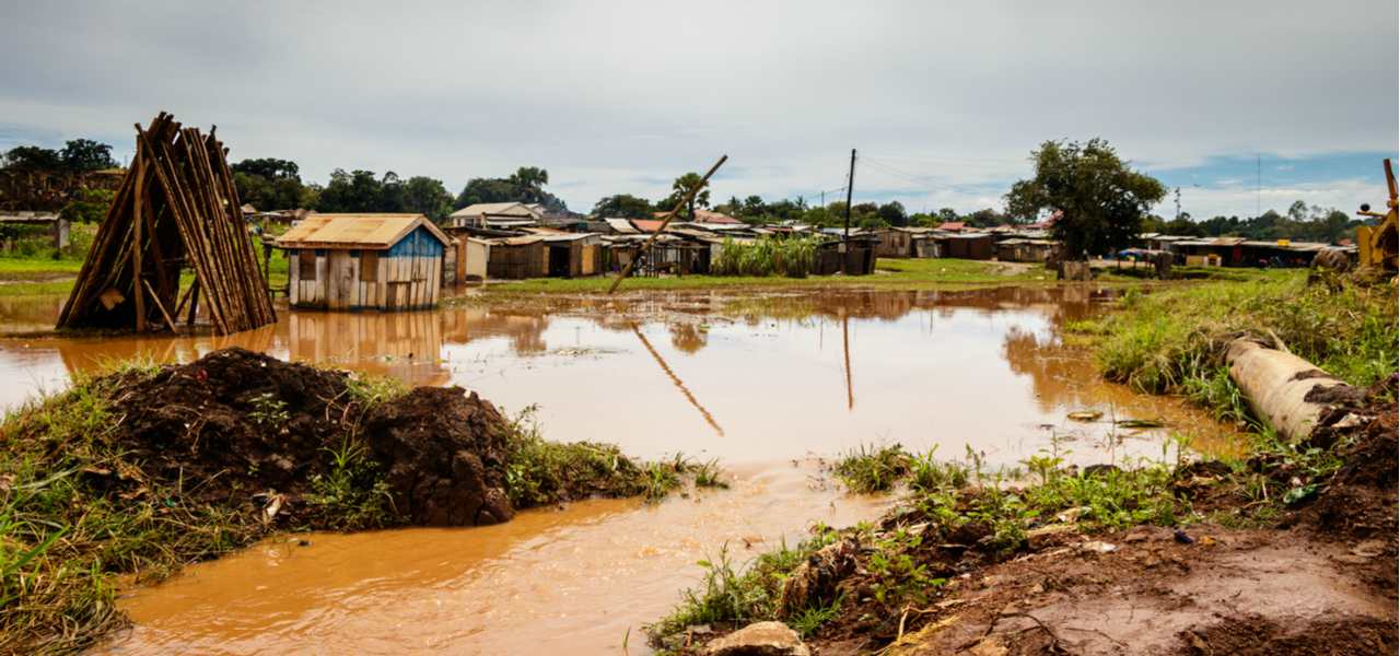 Several houses sit alongside roads washed away by the 2008 flood in the Democratic Republic of the Congo